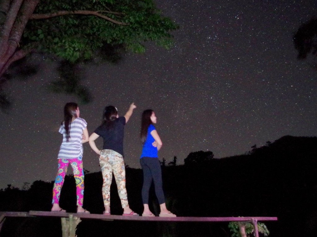 Hikers admire the night sky from the campsite of Mt. Batulao in this photo by Francis Ford Gomez. 